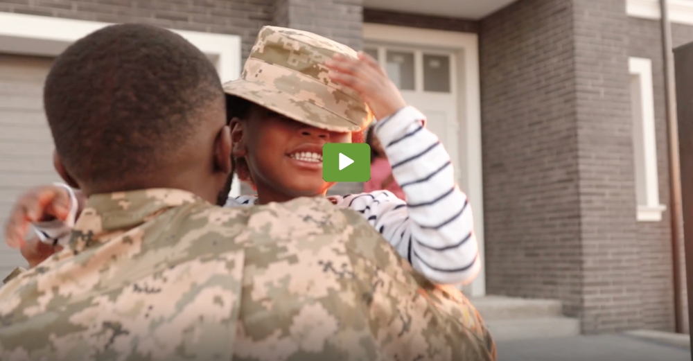 Soldier Coming Home with play button overlaid